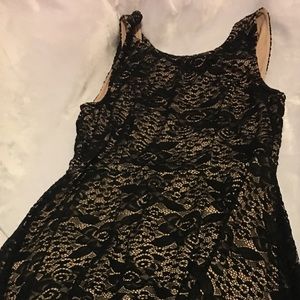 Black and knee-length Kohl’s dress